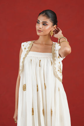 Aarini white cropped Chanderi jacket with gold hand embroidery - close-up
