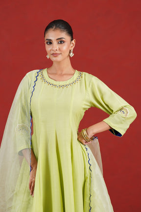 Green kurta hand embroidery neckline detail with blue and gold embellishment