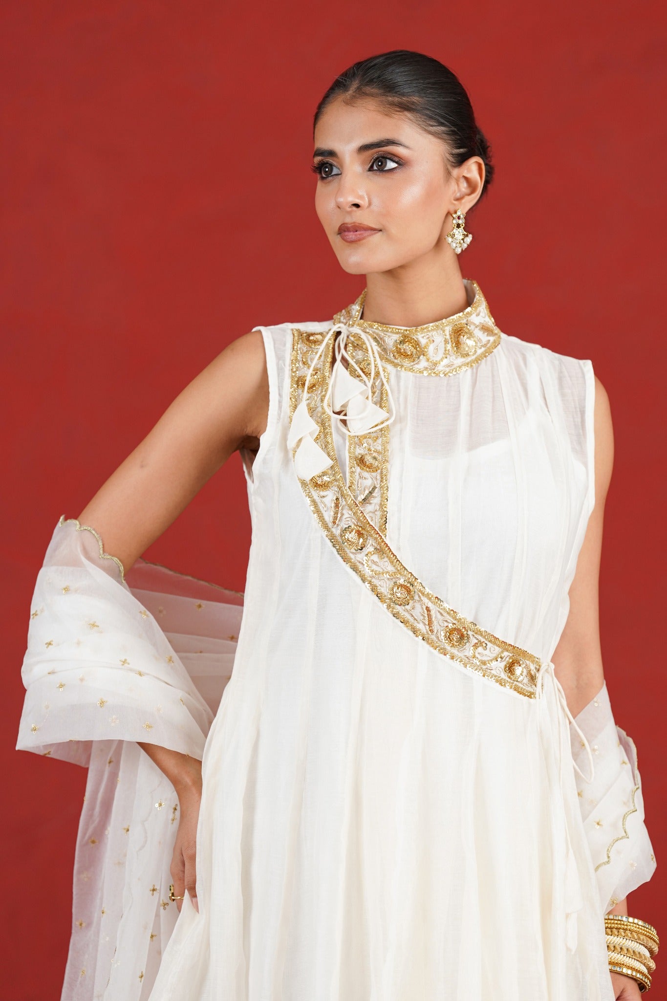 White Chanderi kurta hand embroidered high neckline and wrap detail - close-up