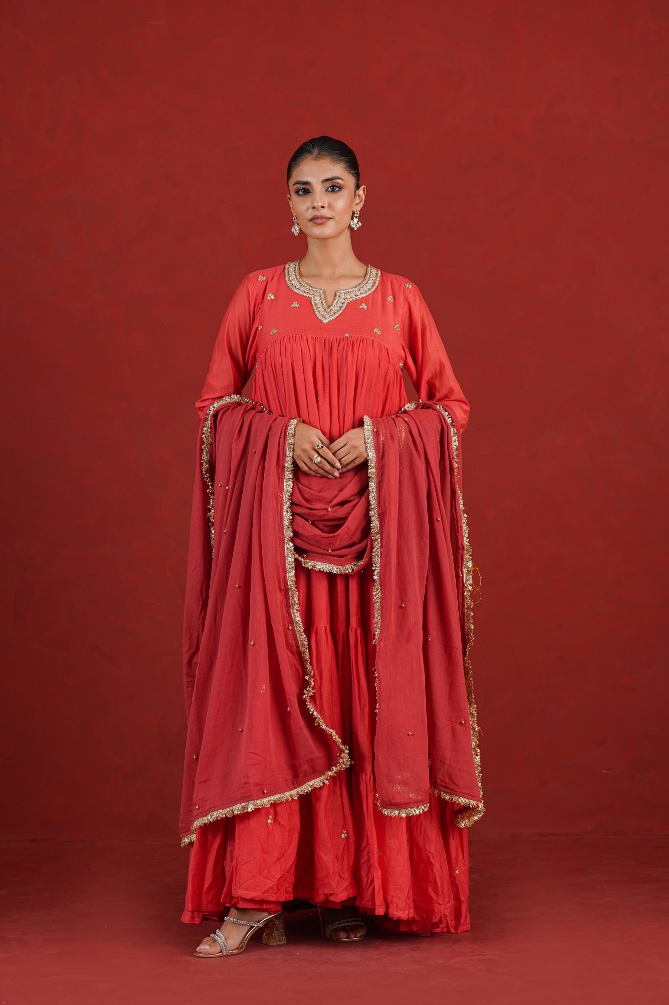 Rust red hand embroidered tiered Chanderi kurta set with dupatta - front view