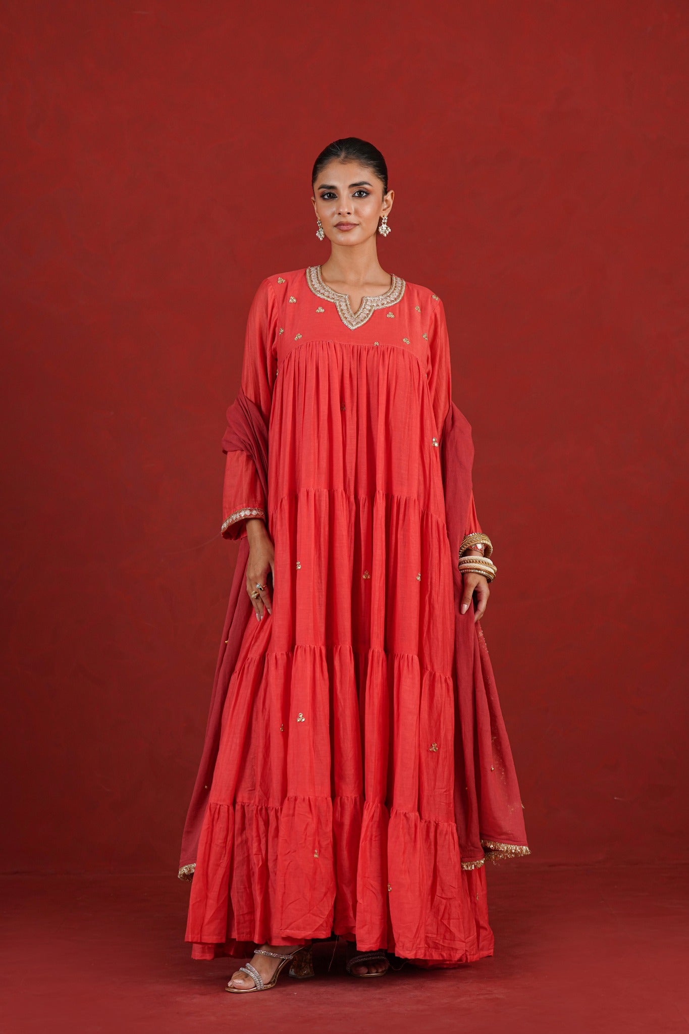 Rust red tiered Chanderi kurta set with gold embroidery - full length front view