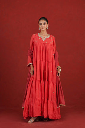 Rust red tiered Chanderi kurta set with gold embroidery - full length front view