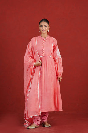 Peach Kota Doriya flared kurta with churidar and dupatta - full front view