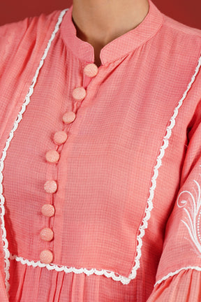 Peach Kota Doriya kurta fabric buttons and white lace yoke detail - close-up