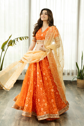 VRISTHI ORANGE EMBELLISHED LEHENGA WITH GOLDEN DUPATTA