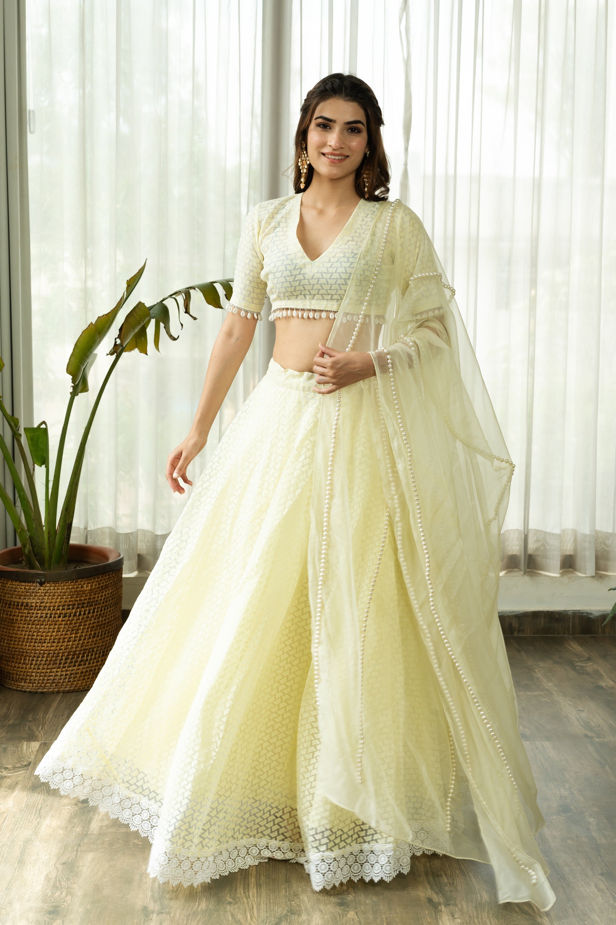 SUDHA IVORY LEHENGA SET WITH PEARL DUPATTA - Sarnya