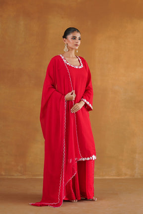 Gulnaar red embroidered kurta set detail view