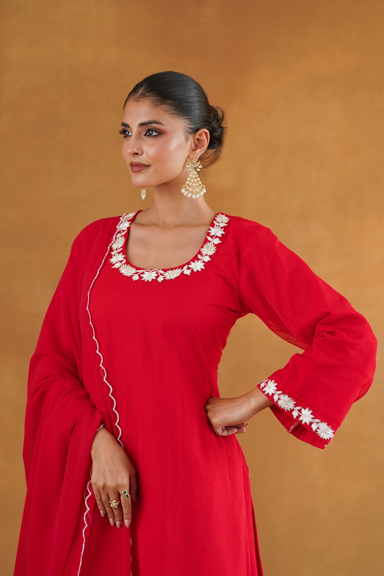 Gulnaar red embroidered kurta set side view