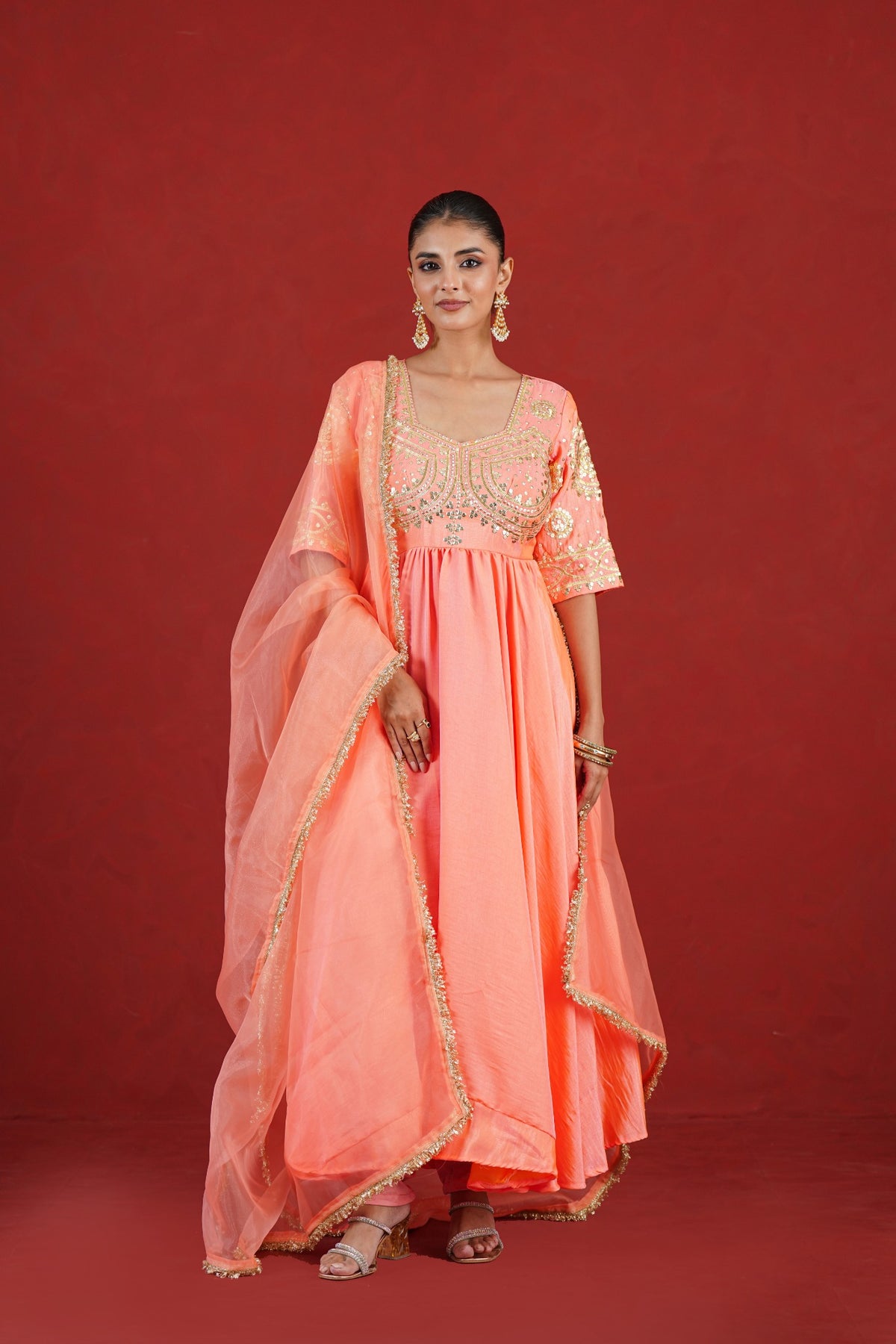 Inara peach hand embroidered flared kurta set front view