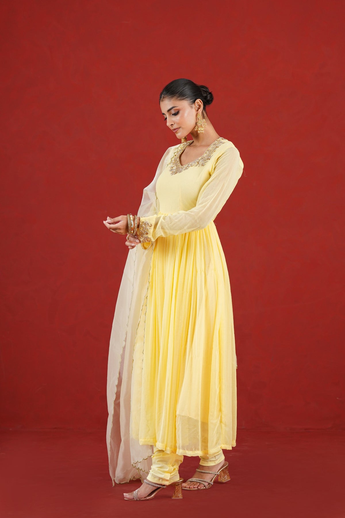 Noor yellow flared kurta set side view with organza dupatta
