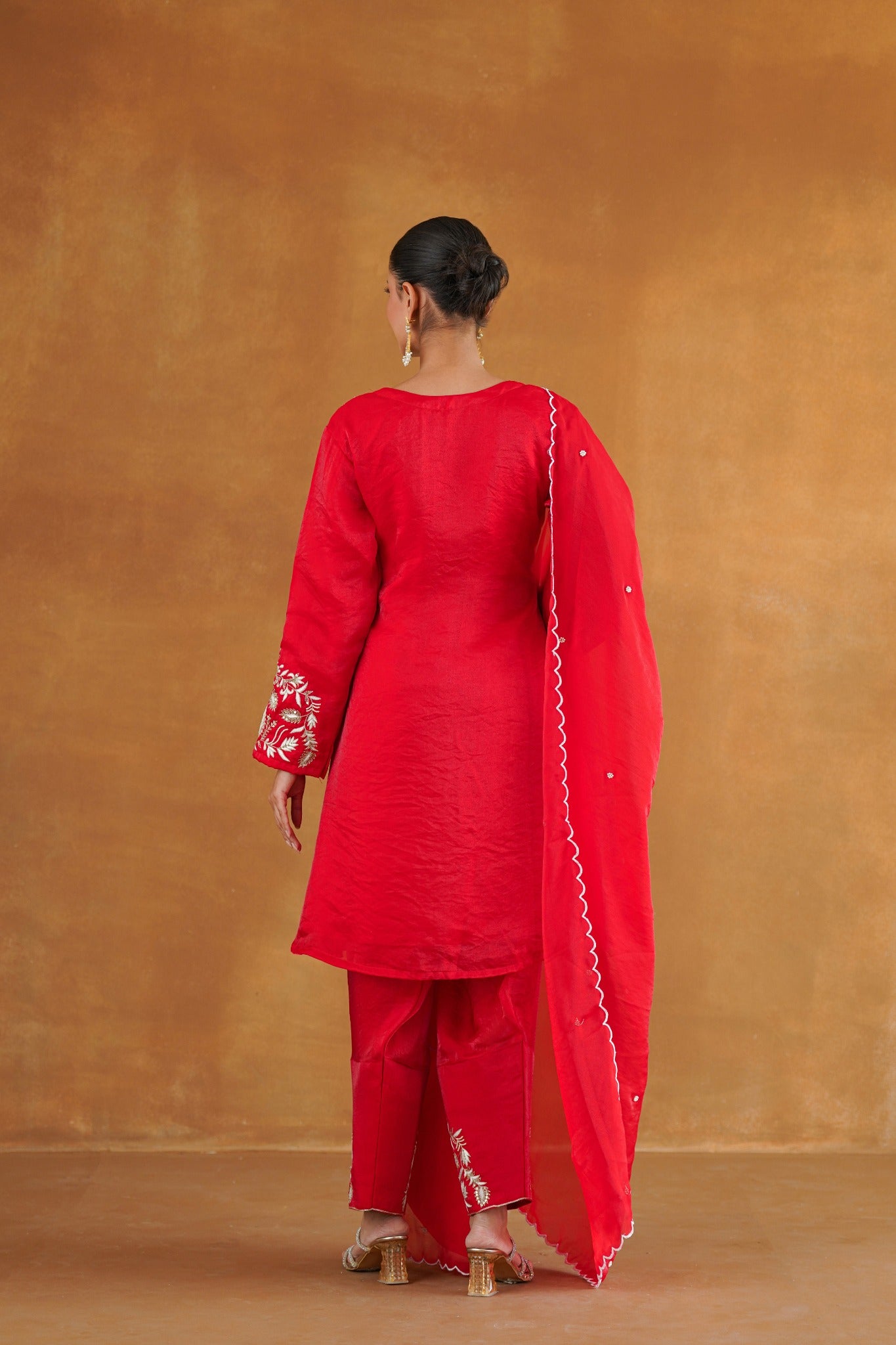 Zarveen red hand embroidered salwar kurta set back view