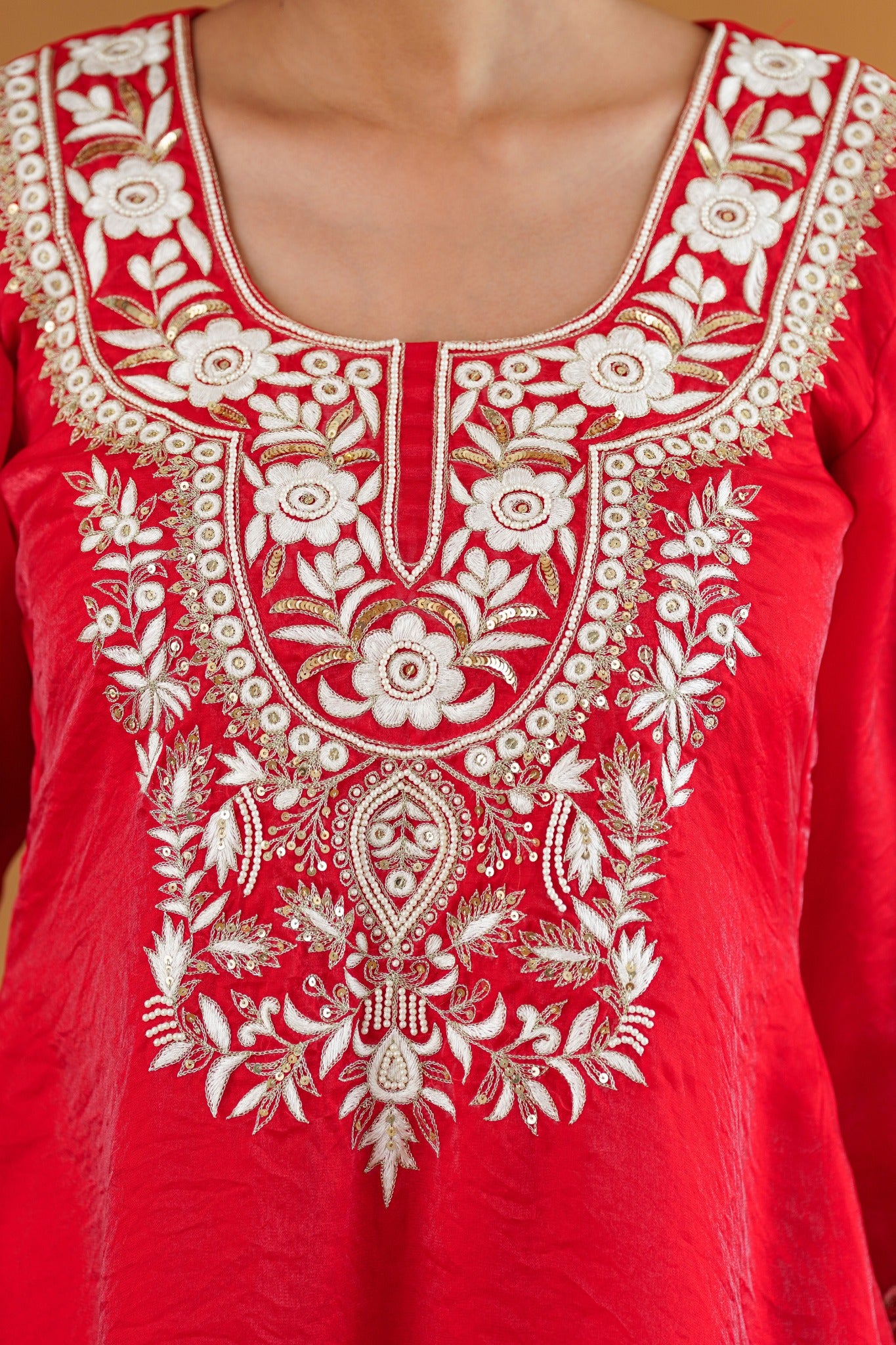 Zarveen red kurta intricate hand embroidery close-up